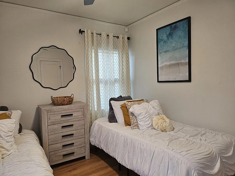 Beautifully decorated extra long twin beds that can double as a queen bed.