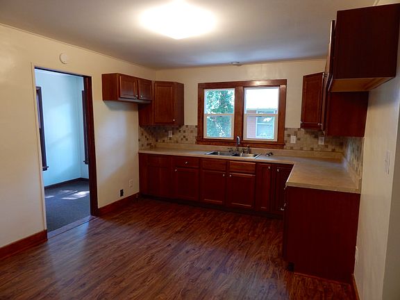 Kitchen with mud room showin
