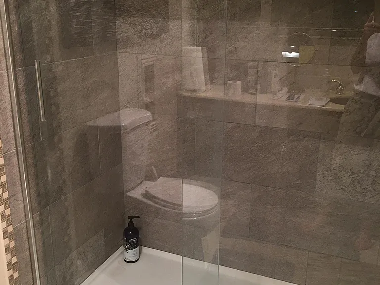 walk in tile shower, private.