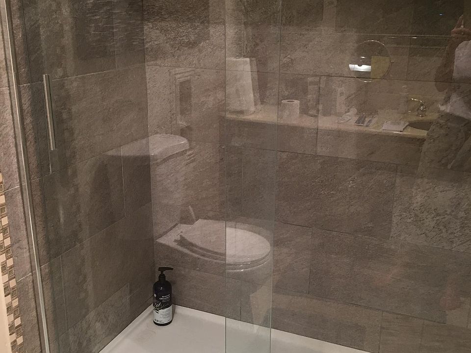 walk in tile shower, private.