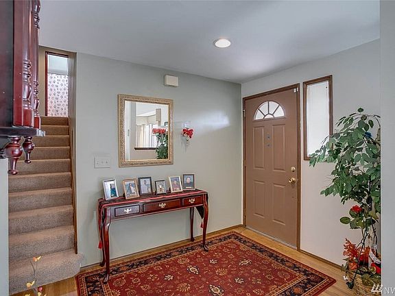 The top floor is where you will relax in the spacious master suite with full bath, more skylights and a walk-in closet. Two more generous sized bedrooms and another full bath round out the top floor. Enjoy your outdoor living in the fully fenced back yard with a two-tiered deck, an in ground sprinkler system in both front and back yards, as well as mature trees, terraced gardens and lots of space to play and entertain. Enjoy convenient shopping, local restaurants and three neighborhood parks.  