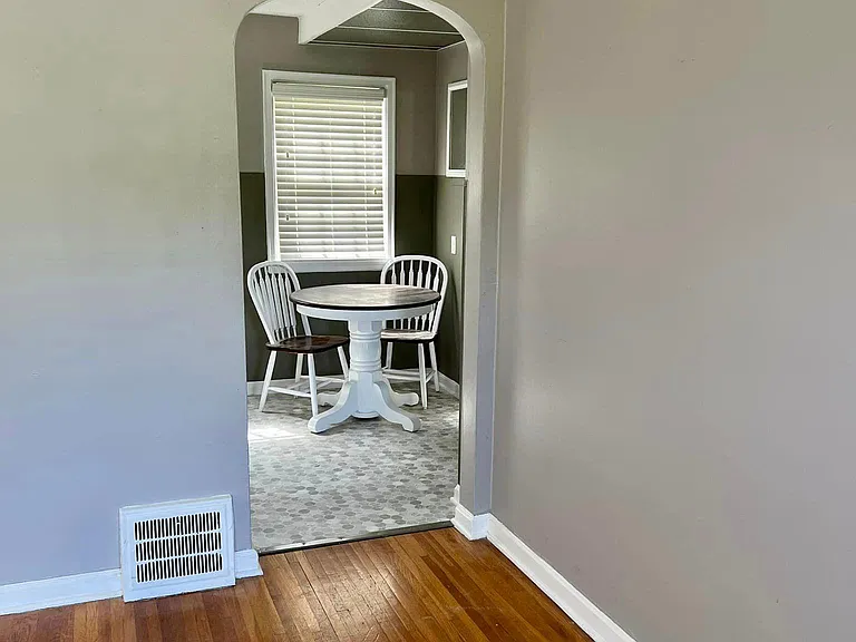 Living room and view to dining/kitchen