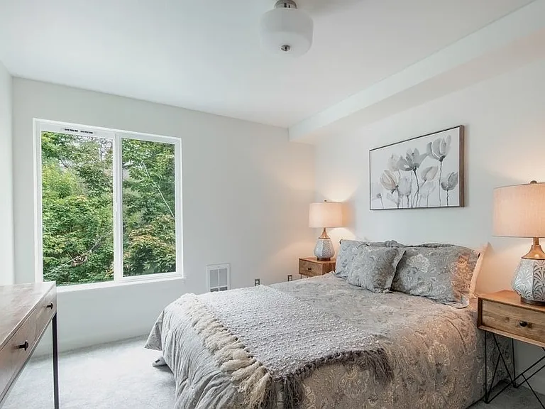 Second bedroom with oversized closet and plush fresh carpet