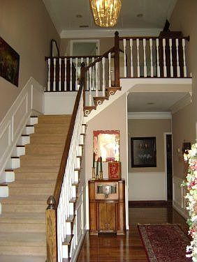 You are greeted by a grand two-story foyer
