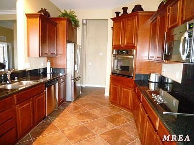Open Kitchen - Cherry Paprika Cabinets