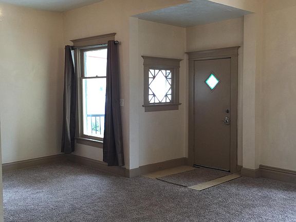 Main floor living area, facing entrance door