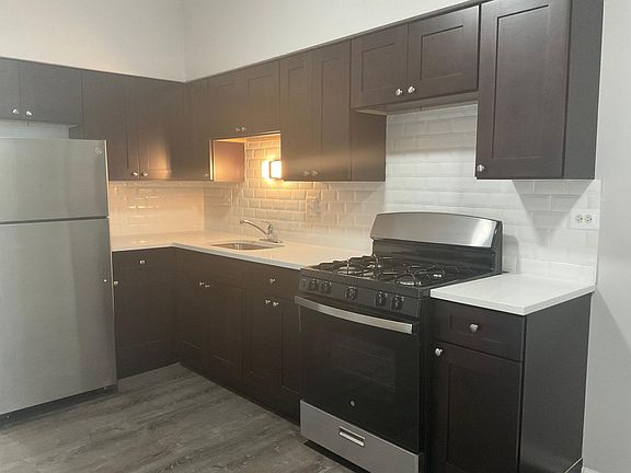 2nd image of 6219 E 62nd St #2