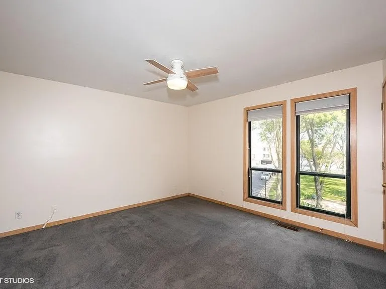 Primary bedroom with 2 walk in closets
