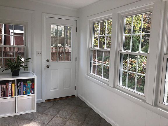 Sunroom with exit to backyard/patio