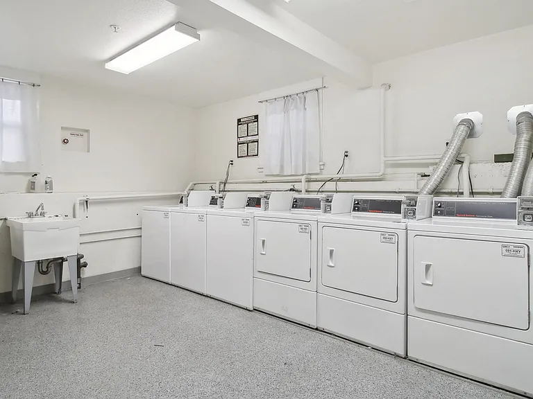 Laundry room with washing machines neatly arranged