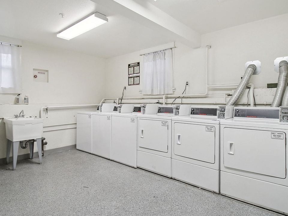 Laundry room with washing machines neatly arranged