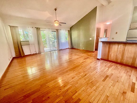 Living and dining area with oak hard-wood floors