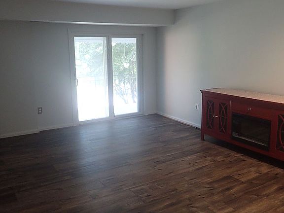 Living room w/ FP console