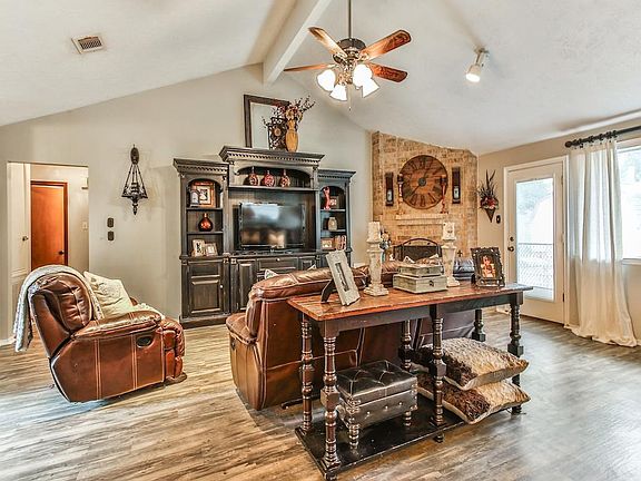 The view of the living room from the dining area....just look at the vaulted ceilings!