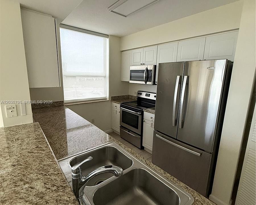 1st image of 19501 W Country Club Dr APT 809