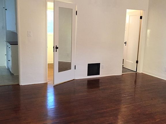 View to bathroom door on the right and office door on the le