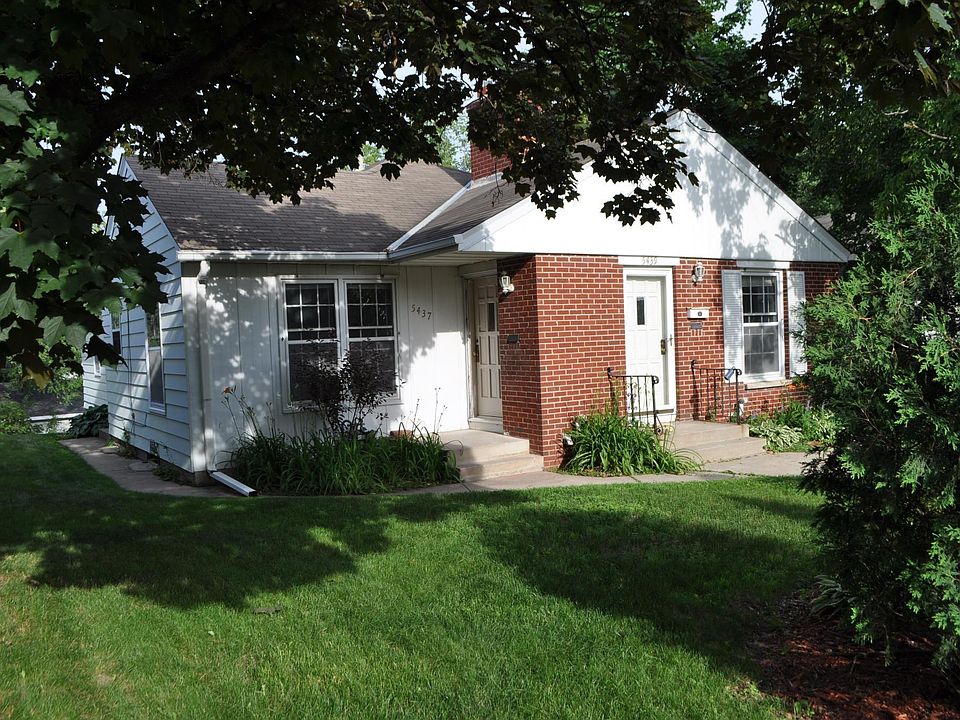 Front of duplex; each unit has a separate entrance