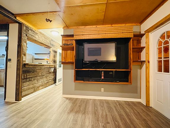 Living room with custom built in entertainment center.
