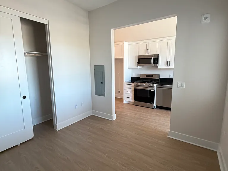 Inside bedroom, doors to be installed creating more privacy between room and kitchen.