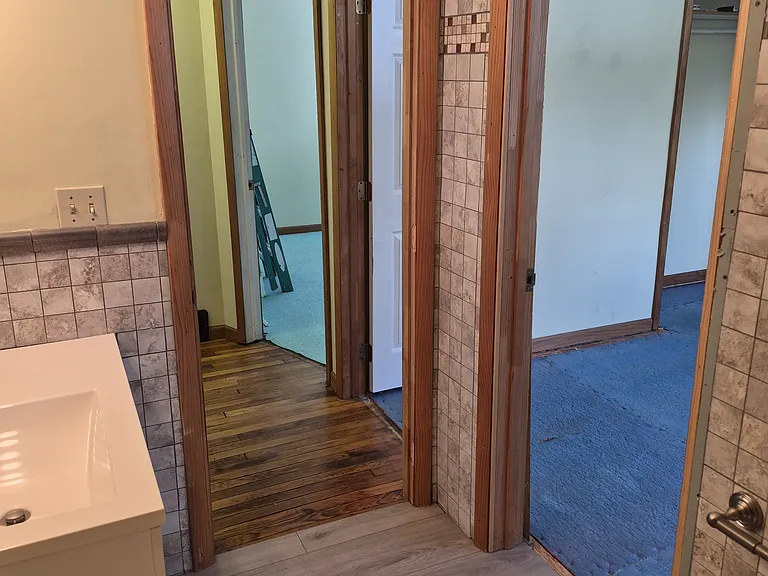 Upstairs bathroom hall. And bedroom entrance