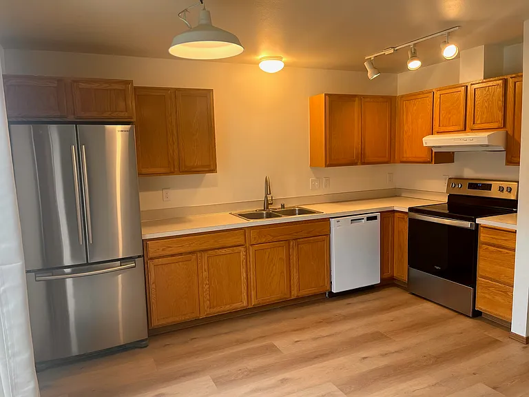 Kitchen with new refrigerator