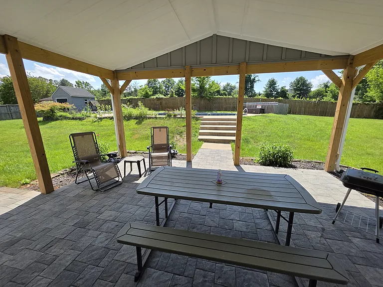 Covered patio with mounted outdoor fan