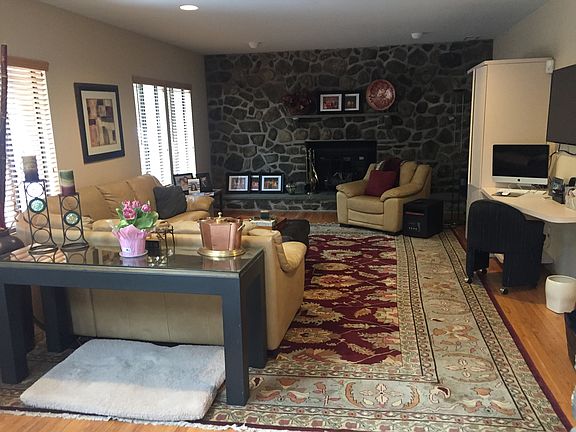 large den with fireplace