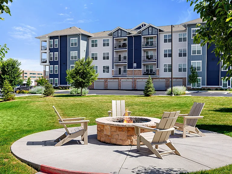 Warm up and unwind around the community outdoor fireplace.