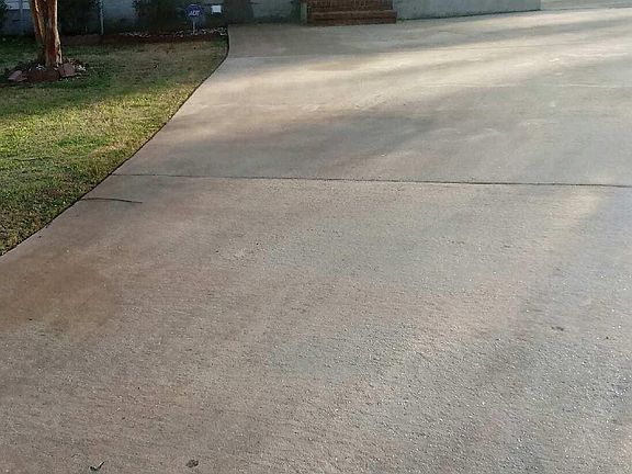 Front view with parking and garage