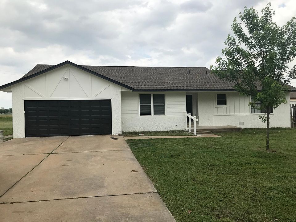 Extensive exterior renovation with new siding, gutters and paint.