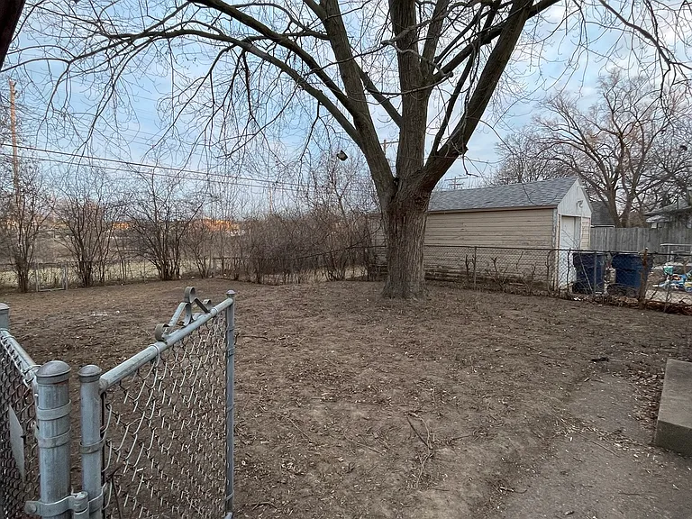 Massive Fenced in Back Yard!