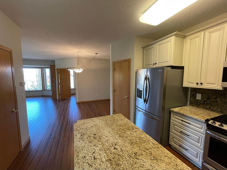Kitchen view into living room and office