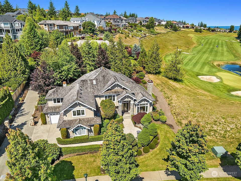 Extraordinary 2-story home situated next to the 8th green at The Club at Snoqualmie Ridge, home to the Boeing Classic.>