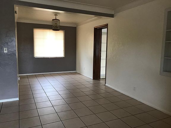 Living room looking into dining area