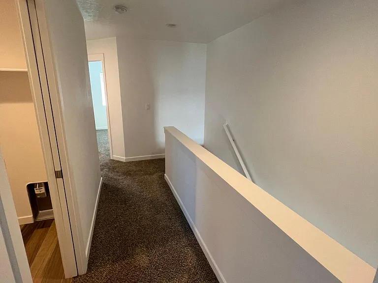 Upstairs landing looking into laundry room