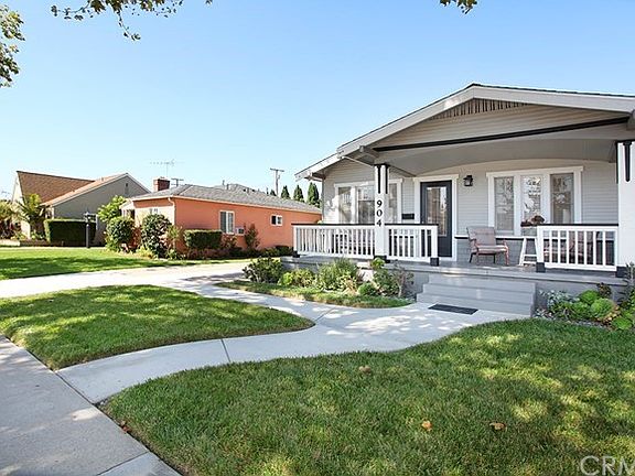 Darling pathway to the front porch. It is the porch that makes the Craftsman homes so special.