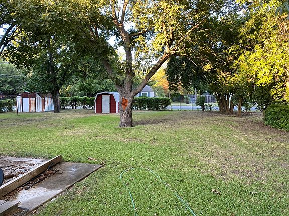 Back yard and storage sheds
