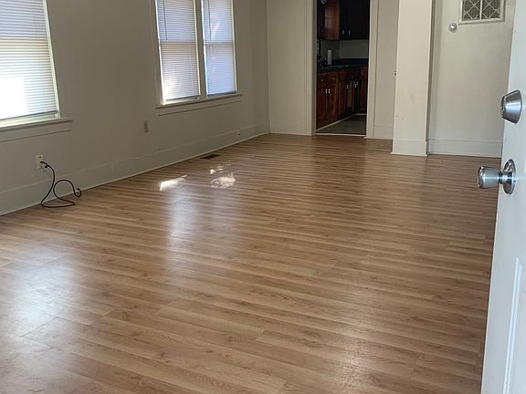 LIVING ROOM LOOKING IN FROM FRONT DOOR