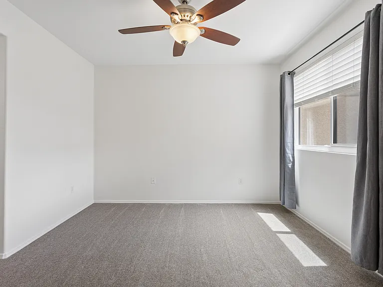 Master bedroom has new carpet, overhead fan, near your own master bathroom