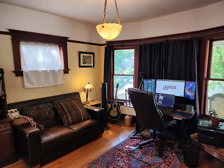 home office (furnished, but doesn't include desk or monitors or guitar)