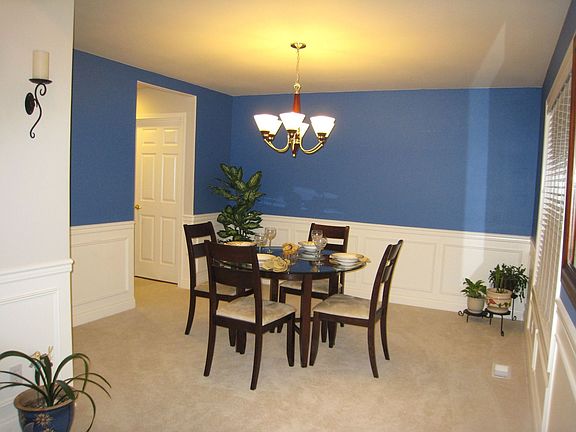 Formal dining room w/white millwork