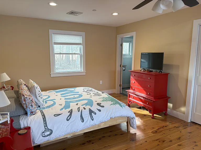 Master bedroom with private bathroom and private access to outside porch
