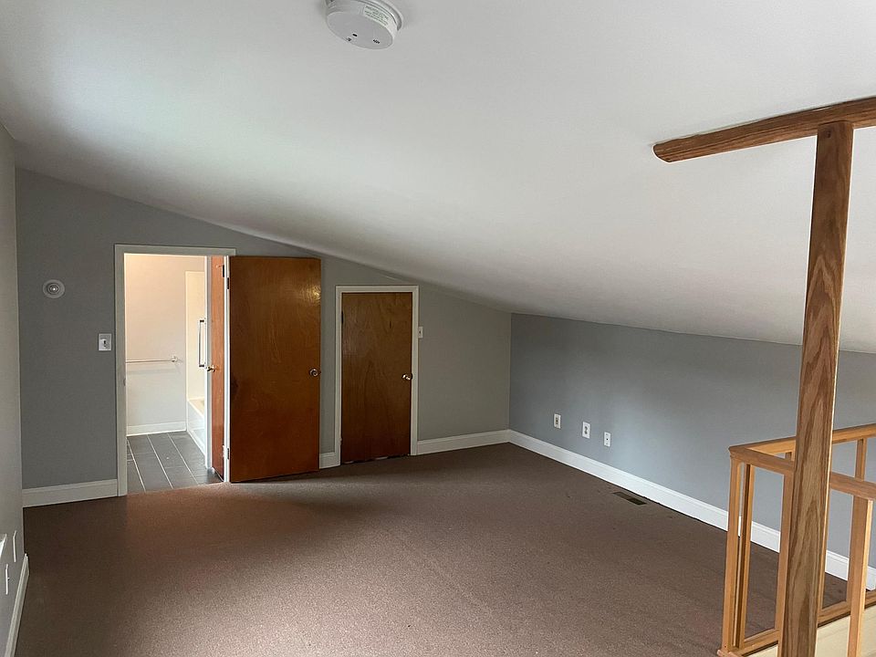 Bedroom with bathroom and walk in closet