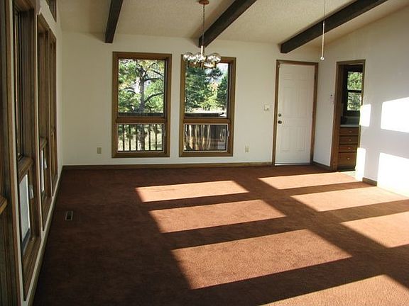 Upper Level Family Room with Plenty of Sunlight Streaming Through the wide Win
