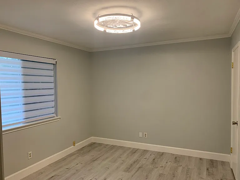10. Third bedroom _ new paint, new zebra blinds, smart Fan and LED lightiing