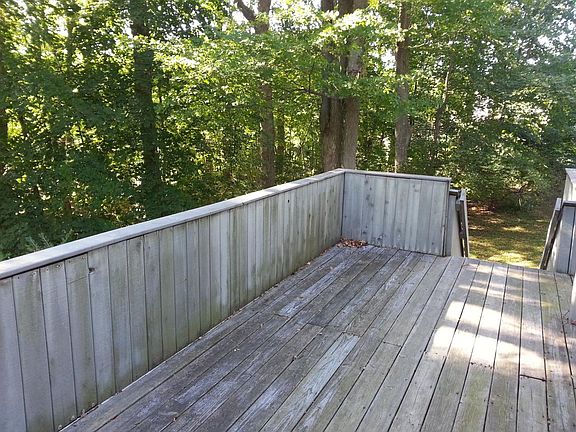 Deck overlooking wooded area
