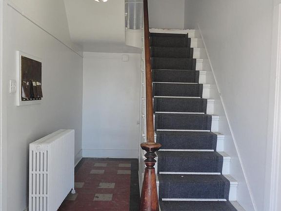 Entry foyer and inside mailboxes.