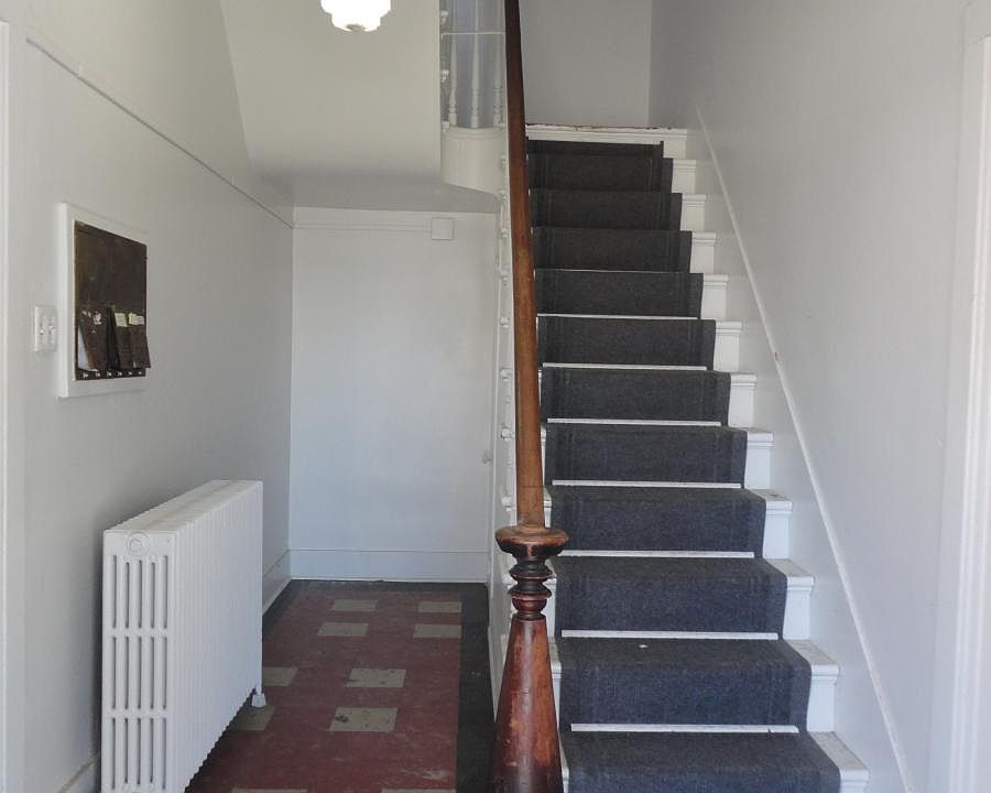 Entry foyer and inside mailboxes.