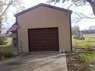 Separate drive w/ garage and Studio Apt inside!