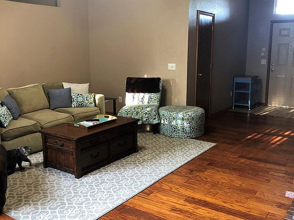 Large living room with beautiful hand scraped hardwood floor